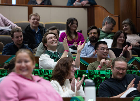 Individuals clapping