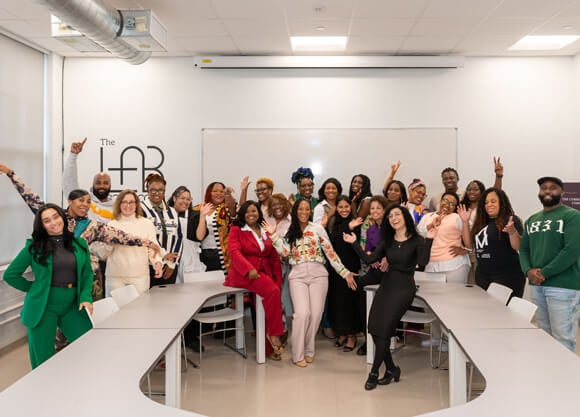 A group of people pose for a photo